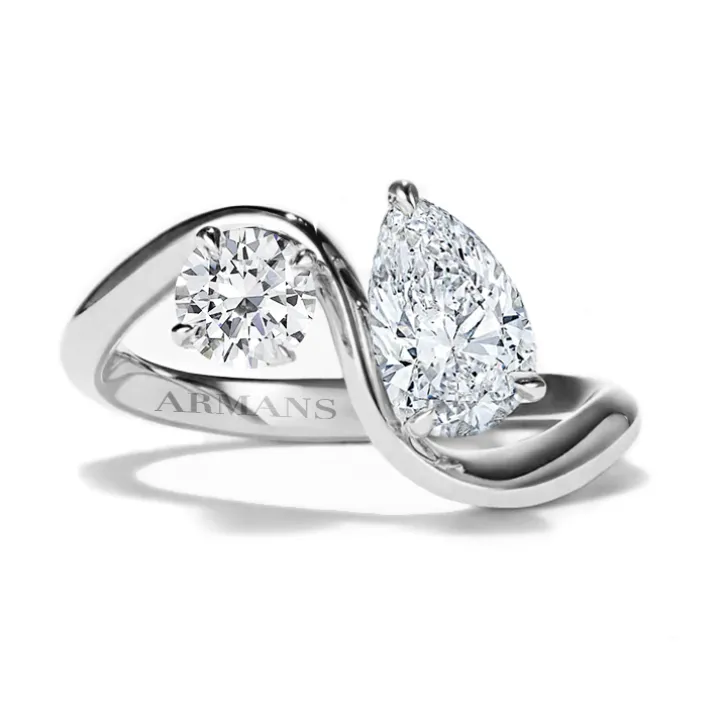 Pear and Round Diamond Twist Ring
