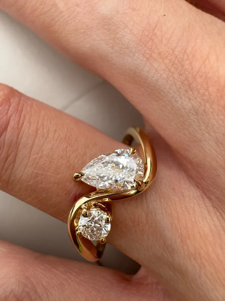 Pear and Round Diamond Twist Ring