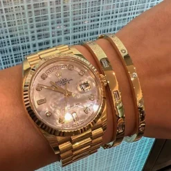Solid Gold and Baguette Diamond Bangle